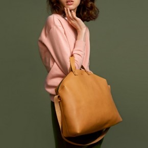 Madura aged yellow leather hand bags