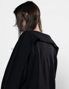 Black geometrical shapes coat